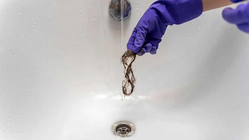 Désobstruction drain douche