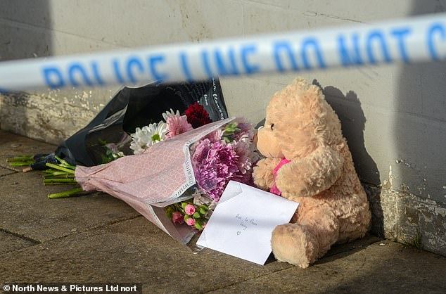 Floral tributes left at the scene in Hexham, Northumberland, after Holly was attacked