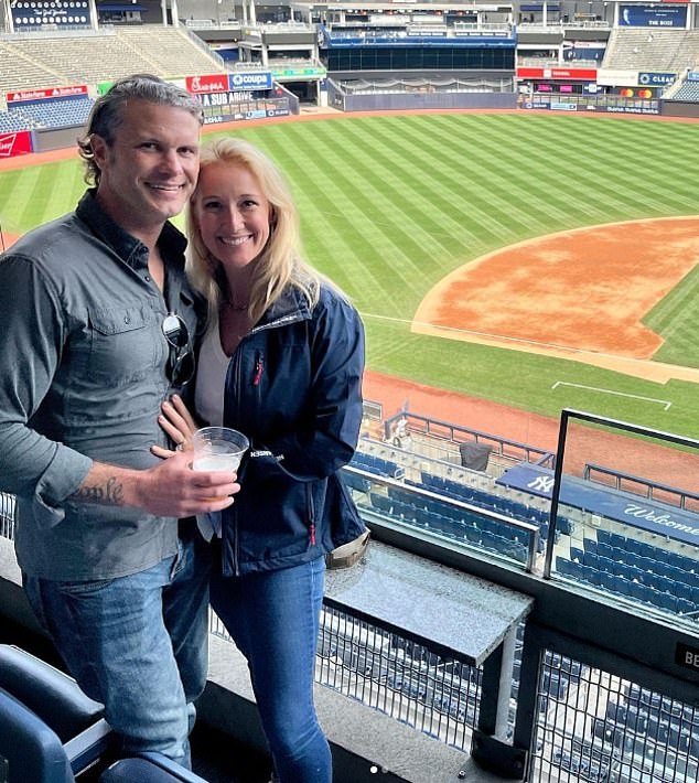 Trump's defense secretary pick is pictured with his wife Jennifer at a baseball game