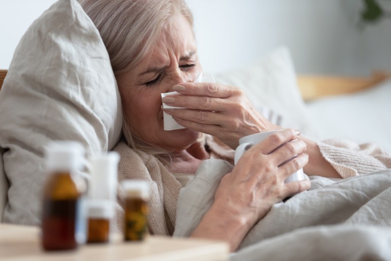 Femme malade au lit