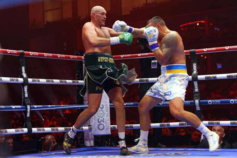 Fury et Usyk dans leur précédent combat