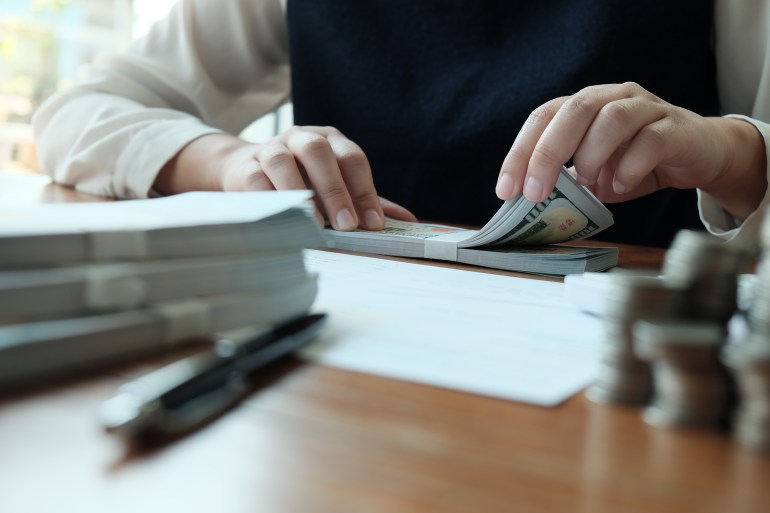 Businessman analyzing investment charts