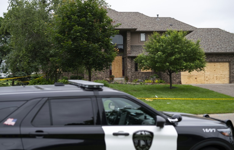 Voiture de police devant la maison de la victime au Minnesota