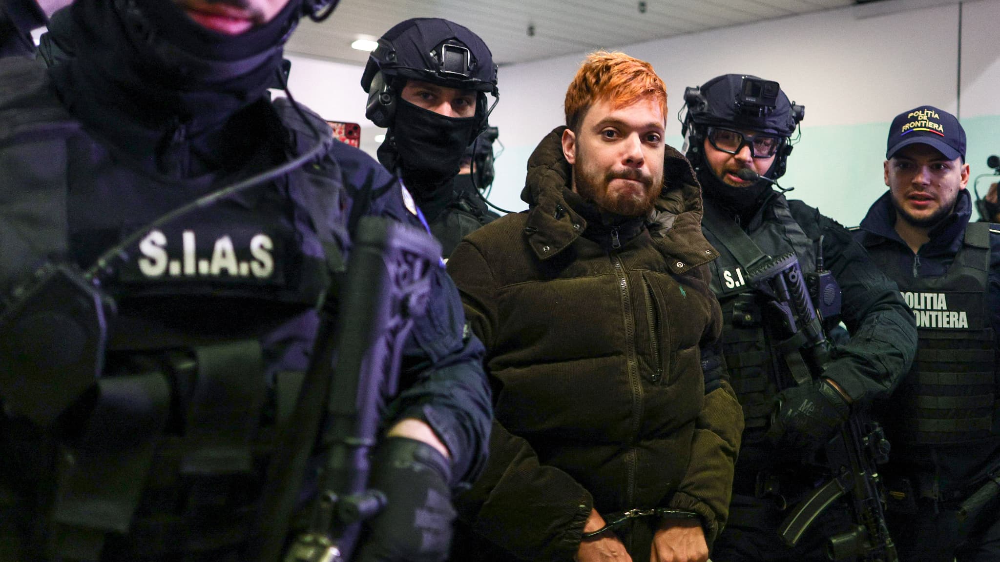 Mohamed Amra escorté à l'aéroport de Bucarest