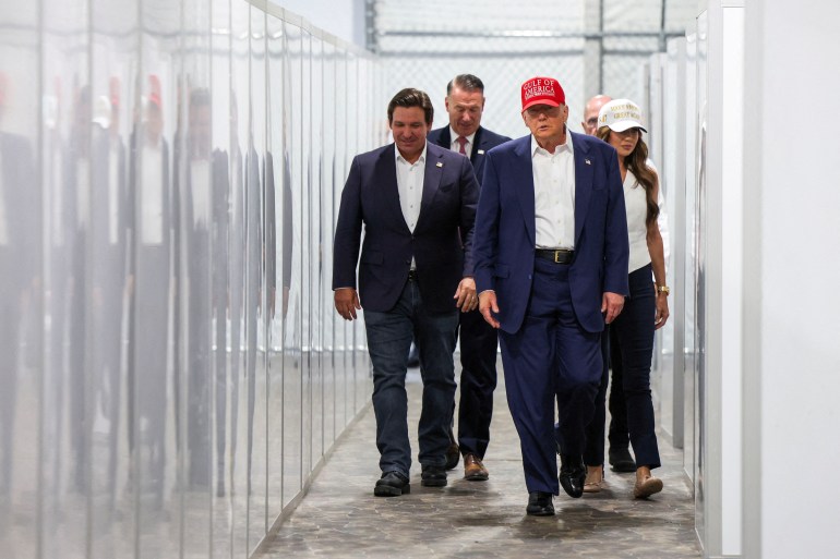 Donald Trump lors de l'inauguration d'un centre de détention pour migrants, juillet 2025.