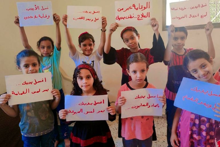 Séance de sensibilisation à l'hygiène pour les enfants dans un camp de déplacés à Gaza