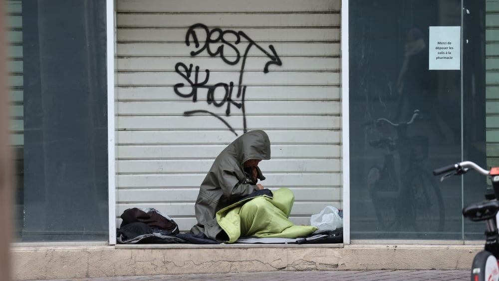 Illustration représentant des sans-domicile dans une ville