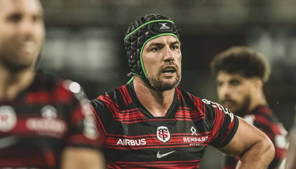 François Cros sur le lit d'hôpital